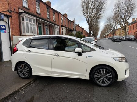 2014 Honda Fit 1.5 Hybrid Automatic, Only 113kms! New Nct 12/2026, Reversing Camera, Bluetooth, Sat Nav, Immaculate Condition, Cheap Tax @ €170, A/C, Alloys, Service & Warranty Included, SIMI Dealer, €8,950